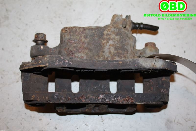 Bremsecaliper venstre foran til Mitsubishi Pajero 2000-2006 (Type III) (2,8 TD|)