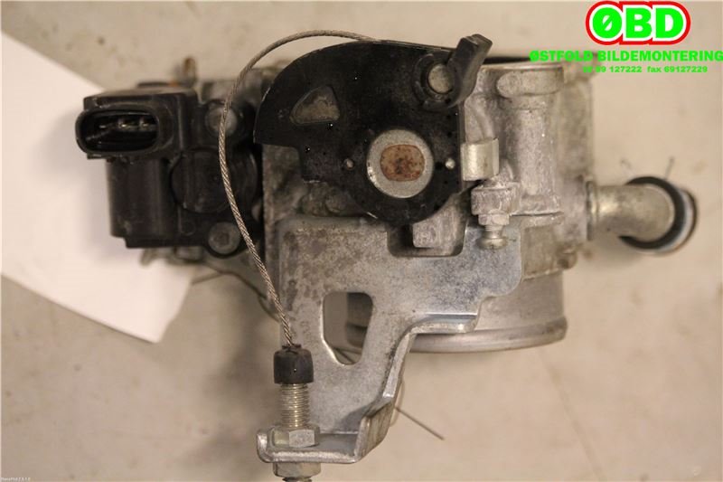 Spjeldhus til Suzuki Swift 2005-2010  (SUZUKI|13400-84E12|)