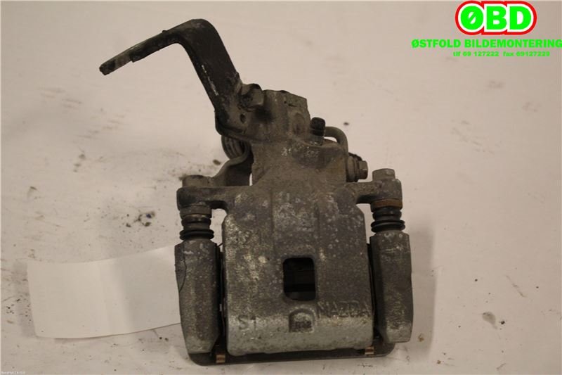 Bremsecaliper venstre bak til Mazda CX-3 2015-2022  (MAZDA|D1Y12699Z|)