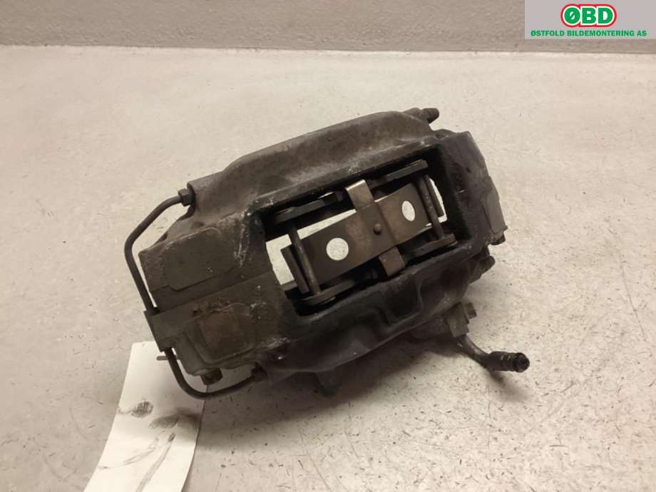 Bremsecaliper venstre foran til Tesla Model S 2013-2016 (Fase 1) (TESLA|1003160-00-D|)