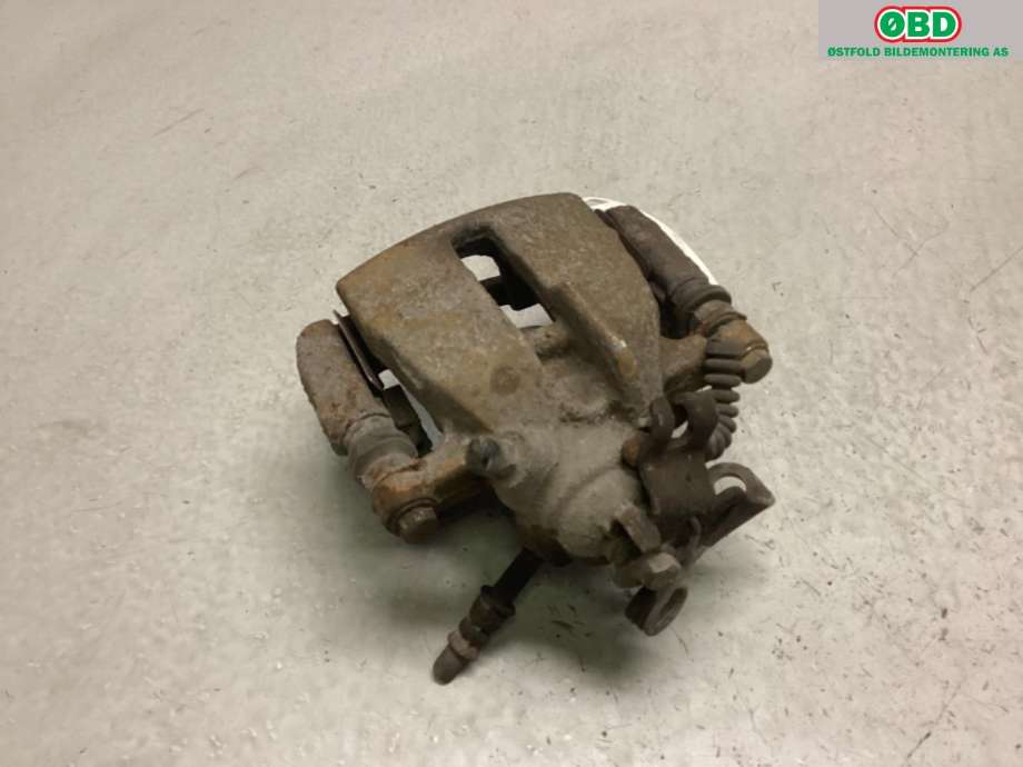 Bremsecaliper høyre bak til VW Transporter / Caravelle 2009-2015 (Fase 2) (T5) (T5) (VOLKSWAGEN|7H0 615 424 A|)