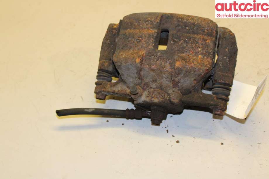 Bremsecaliper venstre foran til Nissan Qashqai 2010-2014 (Type I, Fase 2)  (NISSAN|41011JD00A|)