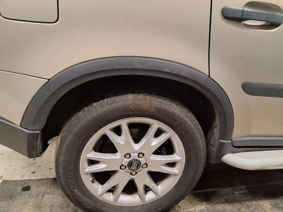 Hjulbuelist venstre foran til Volvo XC90, 2002-2006 (Type I, Fase 1)  (VOLVO|)