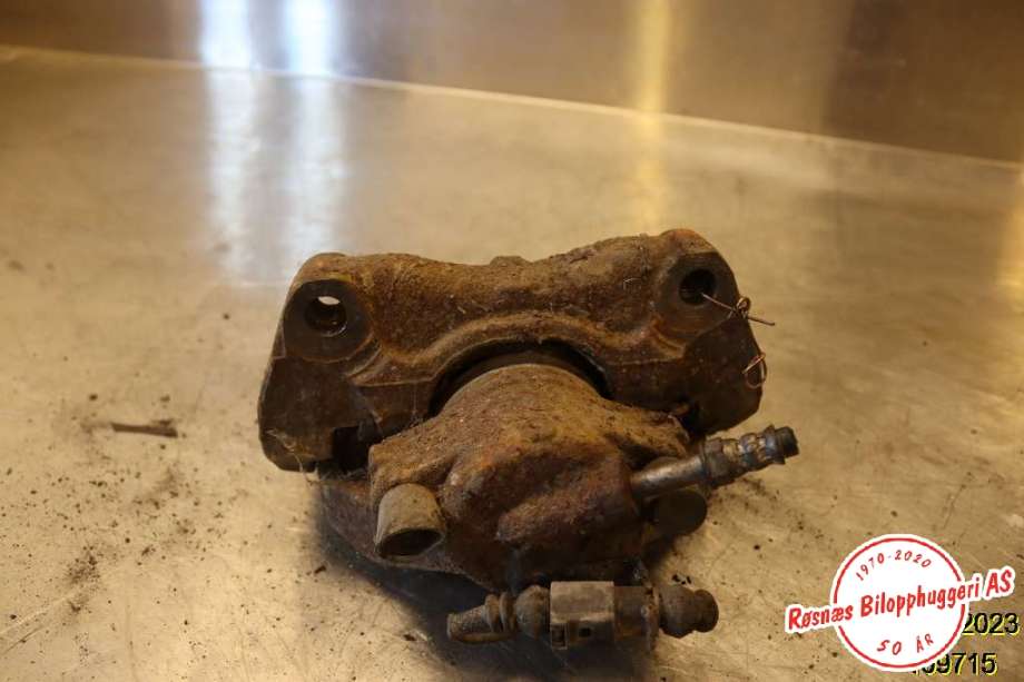Bremsecaliper venstre foran til VW Transporter / Caravelle, 2003-2009 (Fase 1) (T5) (T5) (VOLKSWAGEN|7L6 615 123 F)