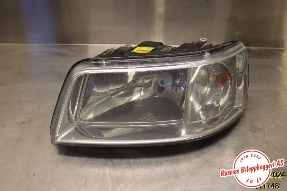 Frontlykt venstre halogen til VW Transporter / Caravelle, 2003-2009 (Fase 1) (T5) (T5) (VOLKSWAGEN|7H1 941 017 N)