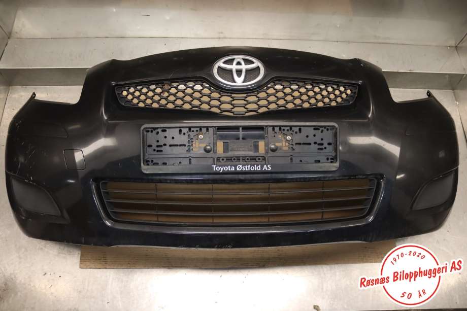 Støtfanger foran til Toyota Yaris, 2009-2011 (Type II, Fase 2) (TOYOTA|521190D908)