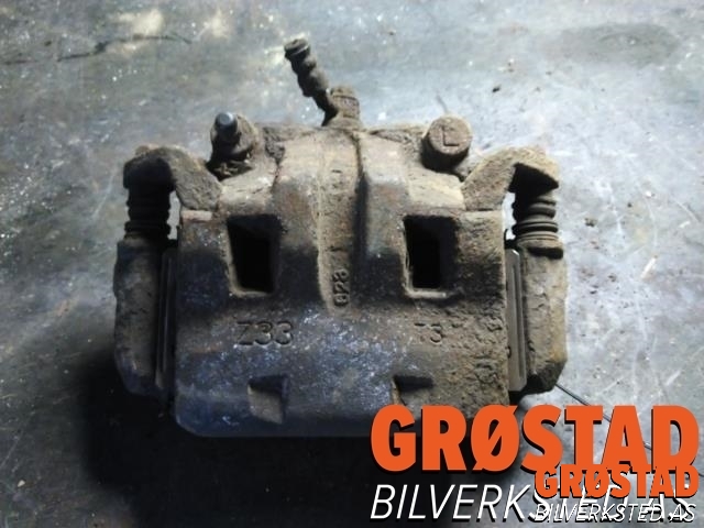 Bremsecaliper venstre foran til Nissan Navara, 2005-2010 (Fase 1) (D40) (D40) (41011EB30A)