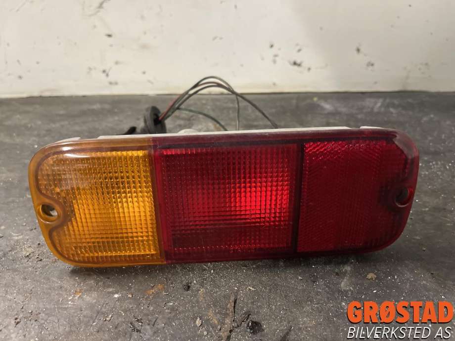 Baklykt fra støtfanger venstre til Suzuki Grand Vitara, XL-7, 2001-2007  (3567081A10)
