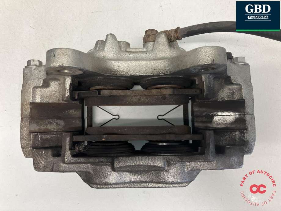 Bremsecaliper venstre foran til Mitsubishi Pajero 2007-2016 (Type IV, Fase 1)  (4605B705|)