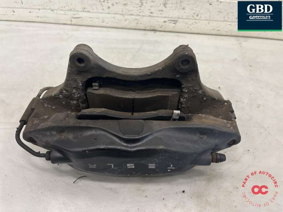 Bremsecaliper venstre foran til Tesla Model X 2016-->>  (1027621-00-C|1007794-00-C|1027621-00-D)