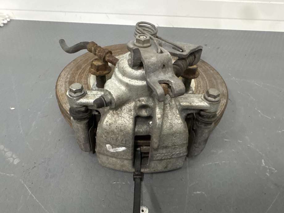 Bremsecaliper venstre bak til VW Transporter / Caravelle 2003-2009 (Fase 1) (T5) (T5) (7H0 615 423 A|BREMSESKIVE 294X22 5/120|)