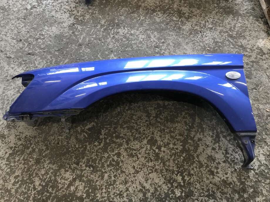 Skjerm venstre foran til Subaru Forester 2002-2005 (Type II, Fase 1)