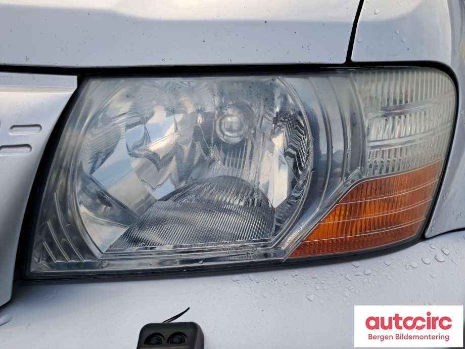 Frontlykt venstre halogen til Mitsubishi Pajero 2000-2006 (Type III)  (MITSUBISHI|MN133751|)