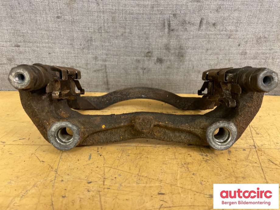 Bremsecaliper brakett til Nissan NV200 2010-2019  (NISSAN|410011VA0B|)