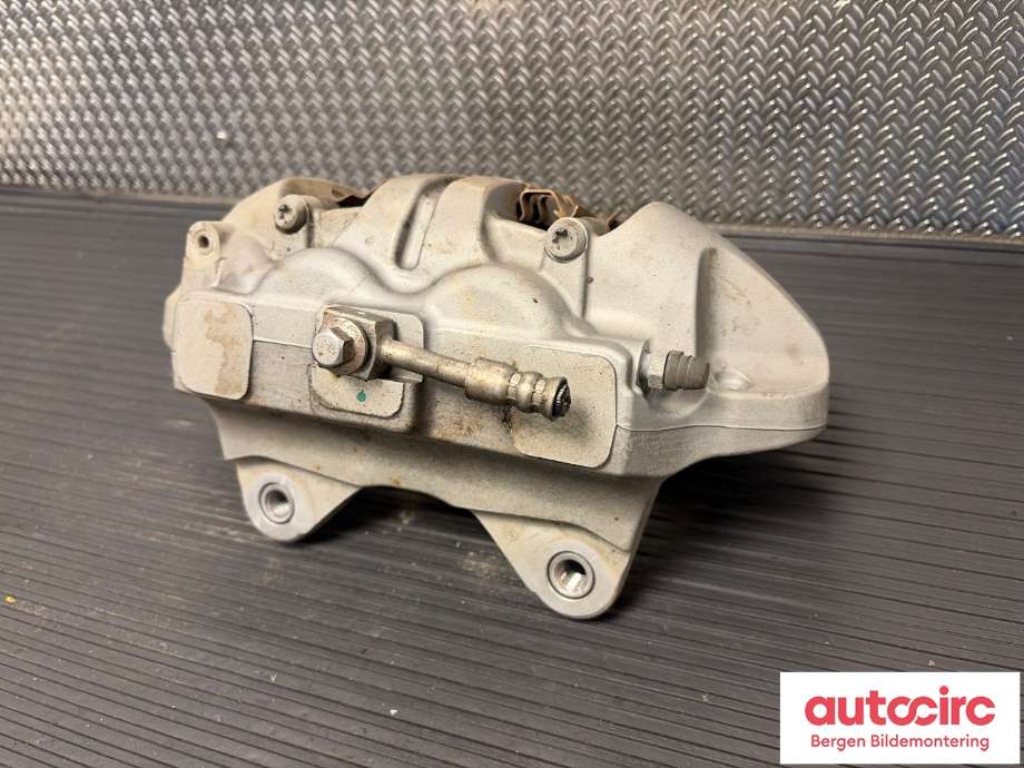 Bremsecaliper venstre foran til Tesla Model Y 2021-2024 (Type I)  (TESLA|1044621-00-E|)