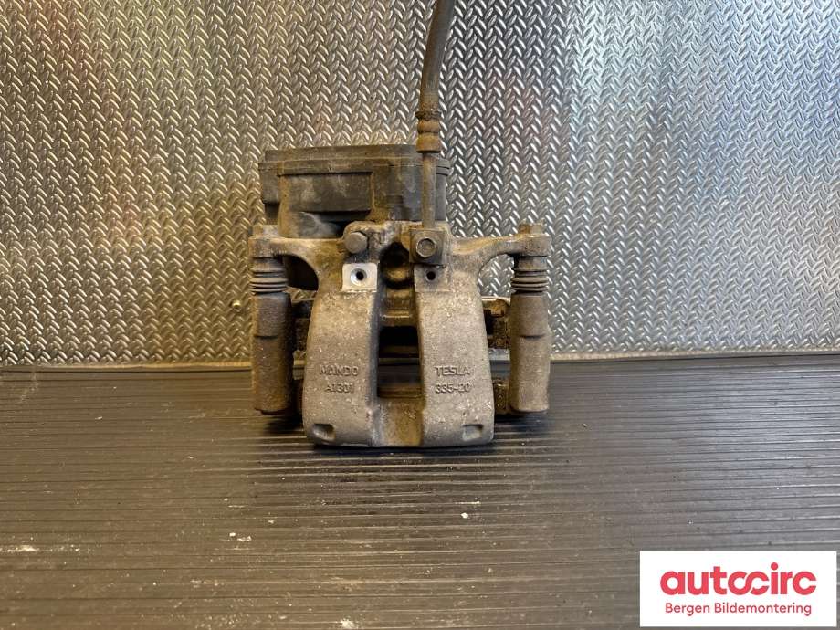 Bremsecaliper venstre bak til Tesla Model 3 2018-2023 (Fase 1) (TESLA|1044623-00-G|)