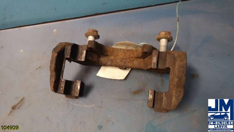 Bremsecaliper brakett til VW Transporter / Caravelle, 2009-2015 (Fase 2) (T5) (T5) (VOLKSWAGEN|7H0 615 125 A)