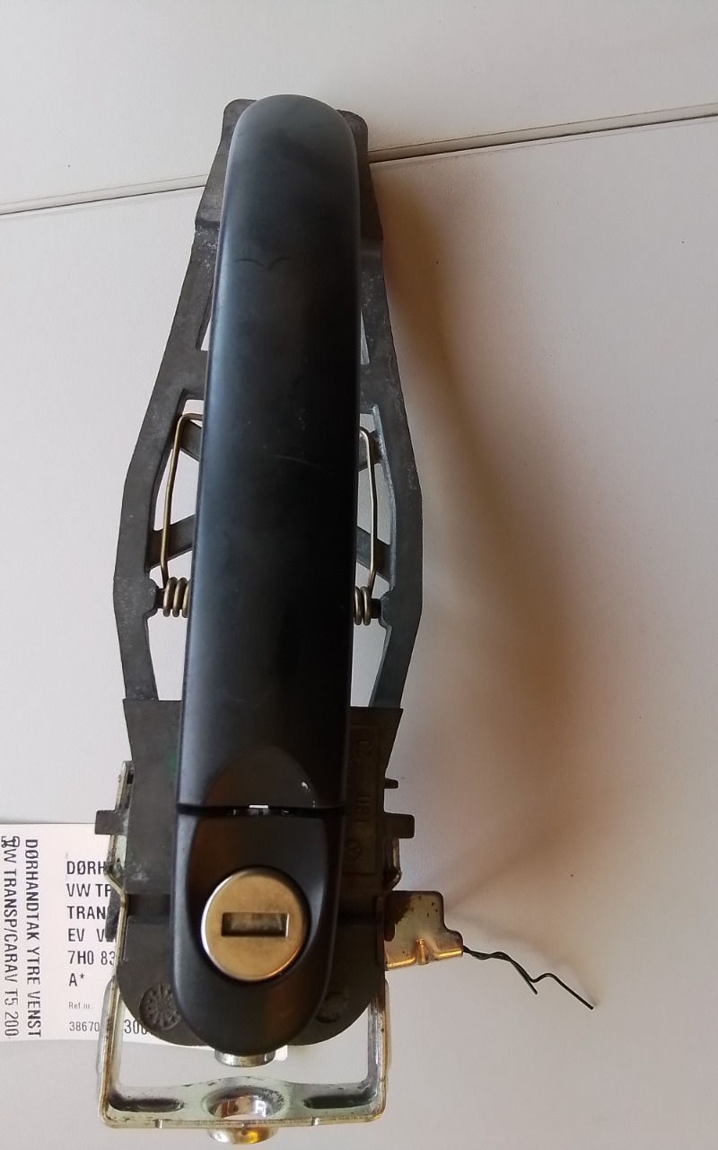 Dørhåndtak utv venstre foran til VW Transporter / Caravelle 2009-2015 (Fase 2) (T5) (T5) (VOLKSWAGEN|7H0 837 205 D|7H0 837 885 C|)