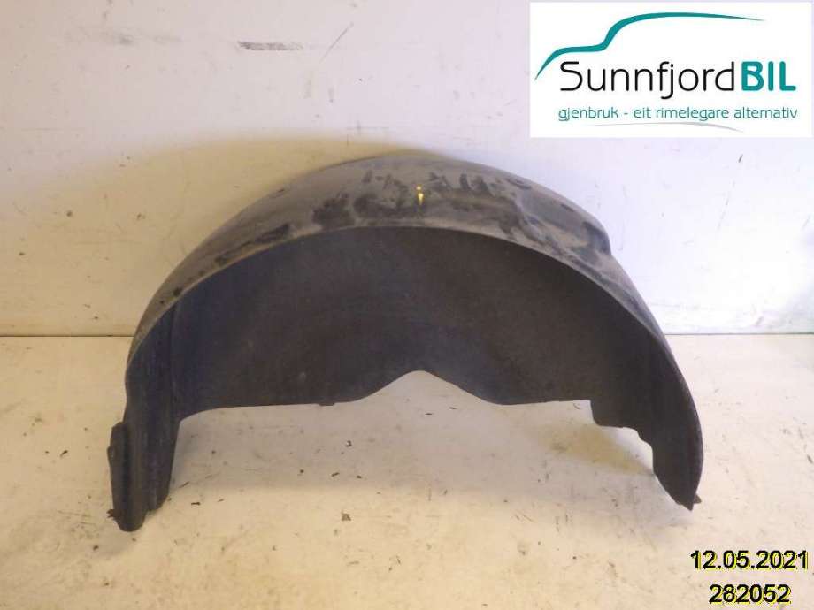 Skjerm locari venstre foran til VW Transporter / Caravelle, 2003-2009 (Fase 1) (T5) (T5) (VOLKSWAGEN|7H0810972B)