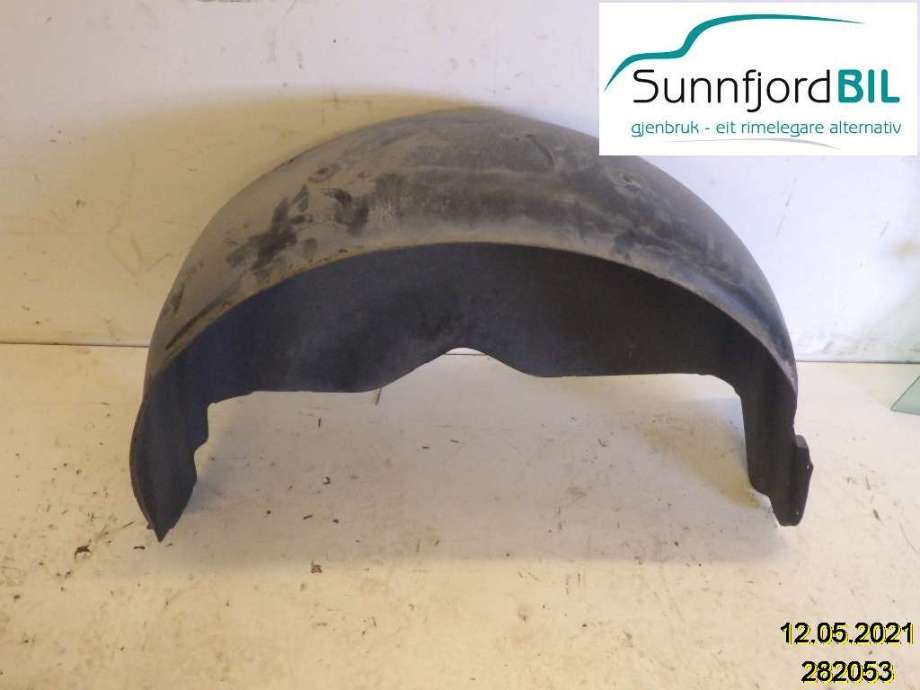 Skjerm locari venstre foran til VW Transporter / Caravelle, 2003-2009 (Fase 1) (T5) (T5) (VOLKSWAGEN|7H0810971B)