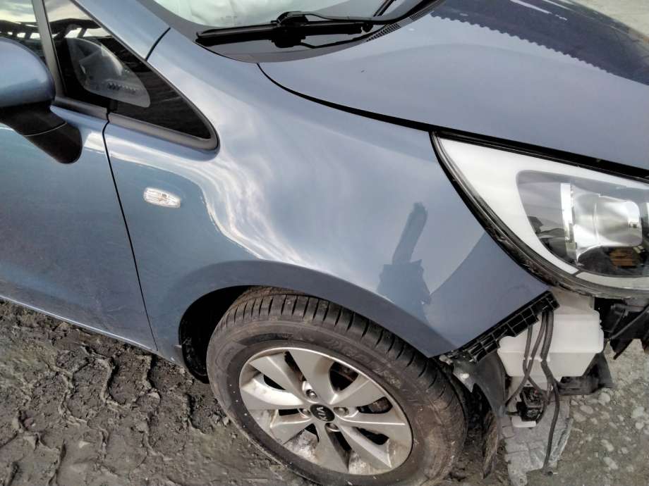 Skjerm høyre foran til Kia Rio, 2011-2017 Type III  (KIA|66321 1W150)