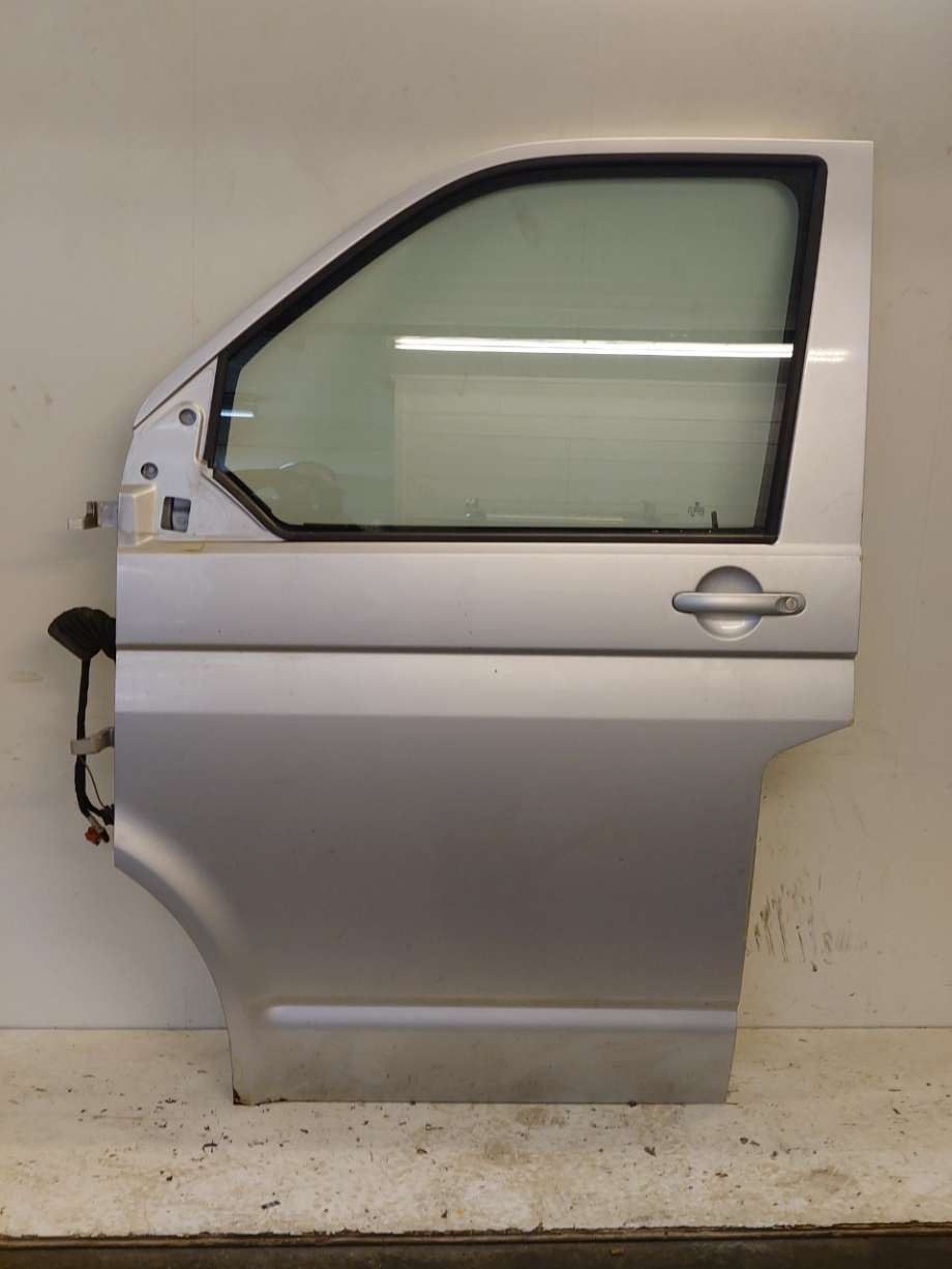 Dør venstre foran til VW Transporter / Caravelle 2003-2009 (Fase 1) (T5) (T5) (VOLKSWAGEN|7E5 831 055 E|7LA 831 055 C|)