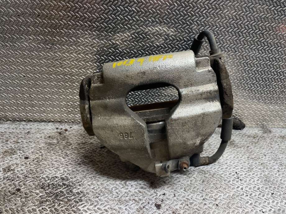 Bremsecaliper høyre foran til VW Transporter / Caravelle 2003-2009 (Fase 1) (T5) (T5) (VOLKSWAGEN|7H0615124C|7L6615124F|)
