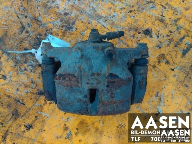 Bremsecaliper venstre foran til Nissan Qashqai, 2007-2010 (Type I, Fase 1)  (41011JD00A)