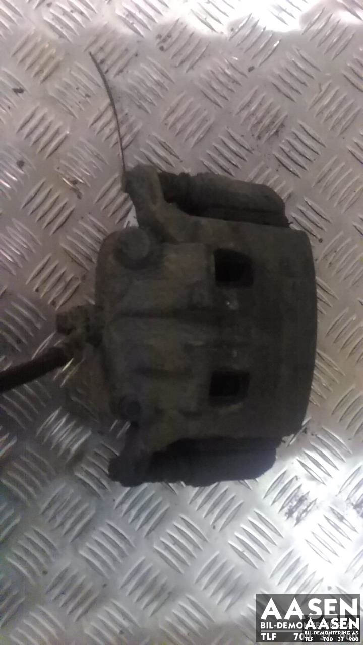 Bremsecaliper venstre foran til Nissan Navara, 2005-2010 (Fase 1) (D40) (D40) (41011EB30A)