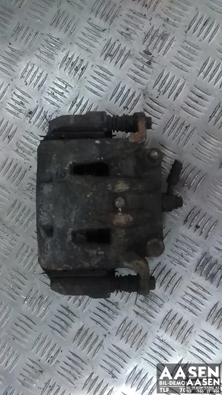 Bremsecaliper høyre foran til Nissan E-NV200, 2014-->>  (410013JY0A)