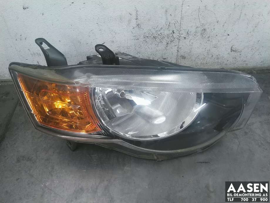 Frontlykt høyre halogen til Mitsubishi Colt, 2009-2013 (Type VII, Fase 2)  (8301B652)