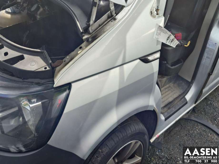 Skjerm venstre foran til VW Transporter / Caravelle, 2015-2019 (T6) (T6) (7E0 821 101 A)
