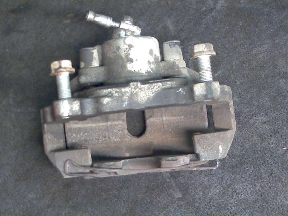Bremsecaliper venstre foran til VW Caddy 2010-2015 (Type III, Fase 2)  (VOLKSWAGEN|)