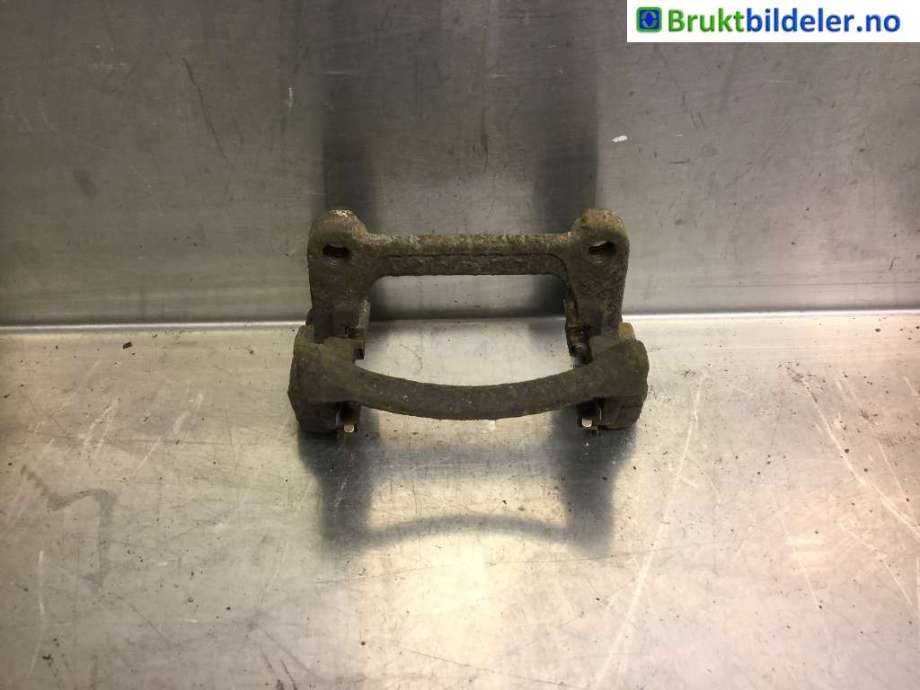 Bremsecaliper brakett til VW Transporter / Caravelle, 2009-2015 (Fase 2) (T5) (T5) (VOLKSWAGEN|7H0 615 425 A)