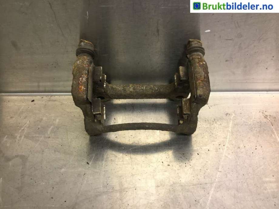 Bremsecaliper brakett til VW Transporter / Caravelle 2009-2015 (Fase 2) (T5) (T5) (VOLKSWAGEN|7H0 615 425 A|)