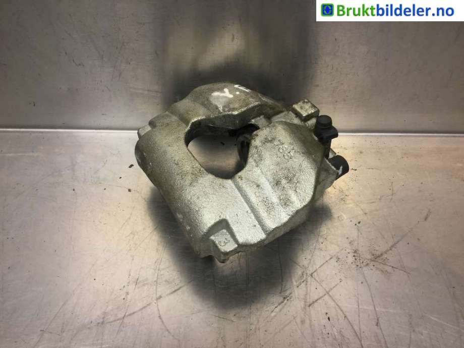 Bremsecaliper venstre foran til VW Transporter / Caravelle, 2009-2015 (Fase 2) (T5) (T5) (VOLKSWAGEN|7H0 615 123 A)
