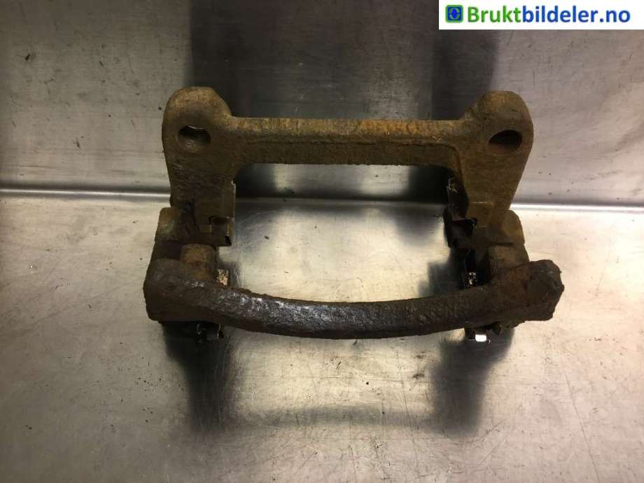 Bremsecaliper brakett til VW Transporter / Caravelle 2009-2015 (Fase 2) (T5) (T5) (VOLKSWAGEN|7H0 615 425 A|)