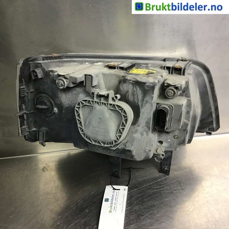 Frontlykt venstre halogen til VW Transporter / Caravelle 2003-2009 (Fase 1) (T5) (T5) (VOLKSWAGEN|7H1 941 015 J|0 301 191 301|)