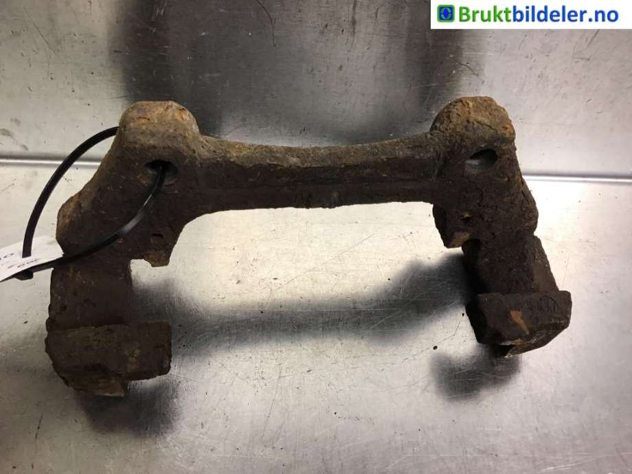 Bremsecaliper brakett til VW Transporter / Caravelle, 2009-2015 (Fase 2) (T5) (T5) (VOLKSWAGEN|7E0 615 125)
