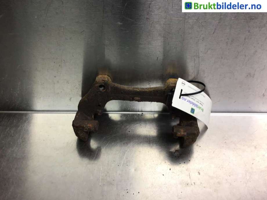 Bremsecaliper brakett til VW Transporter / Caravelle, 2009-2015 (Fase 2) (T5) (T5) (VOLKSWAGEN|7E0 615 125)