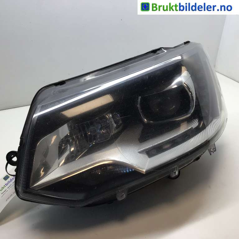 Frontlykt venstre xenon til VW Transporter / Caravelle, 2009-2015 (Fase 2) (T5) (T5) (VOLKSWAGEN|7E5 941 015 O)