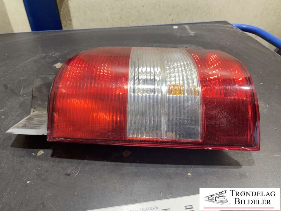 Baklykt venstre til VW Transporter / Caravelle 2009-2015 (Fase 2) (T5) (T5) (7H0 945 095 L|)
