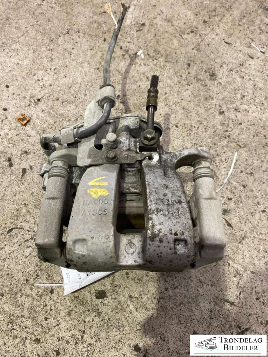Bremsecaliper venstre bak, elektrisk til Tesla Model Y 2021-2024 (Type I) (1044627-00-B|)