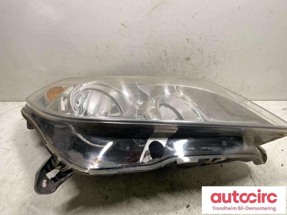 Frontlykt høyre halogen til Opel Astra H 2004-2009  (HELLA|93190070|13239289|1EG270370-42)