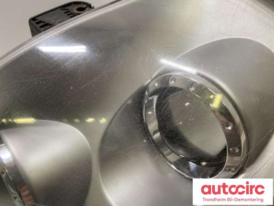 Frontlykt venstre halogen til SsangYong Rexton 2004-2006 (Fase 2) (Y200) (Y200) (LES INFO|8310208203HBC|)