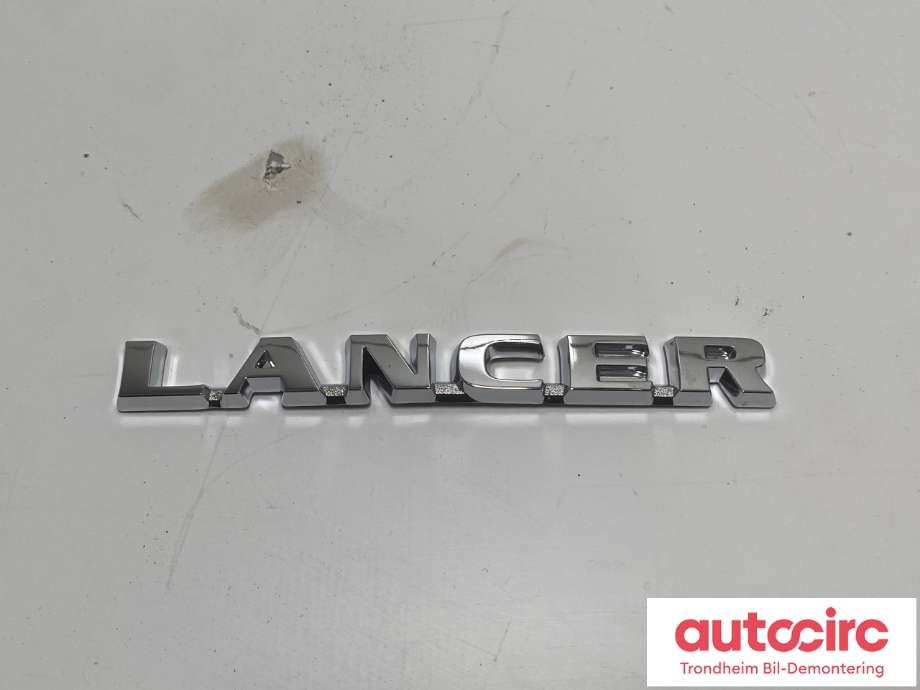 Emblem til Mitsubishi Lancer, 2003-2007  (OEM|MN154914)