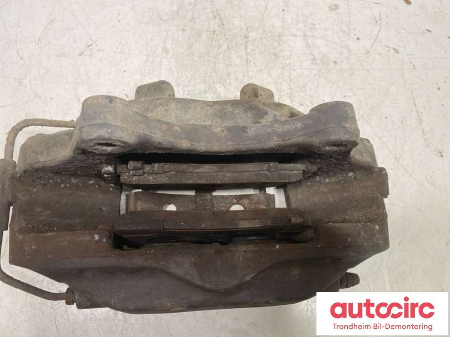 Bremsecaliper venstre foran til Tesla Model S 2013-2016 (Fase 1)  (1003160-00-D|1003160-00-B|1003160-00-C|1007794-00-C|1042639-00-B|1042639-00-C|1042639-00-D|1042639-00-E|1042639-00-F|1042639-98-E|)