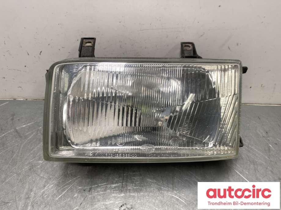 Frontlykt venstre halogen til VW Transporter / Caravelle, 1990-2003 (T4) (T4) (HELLA|701 941 017)