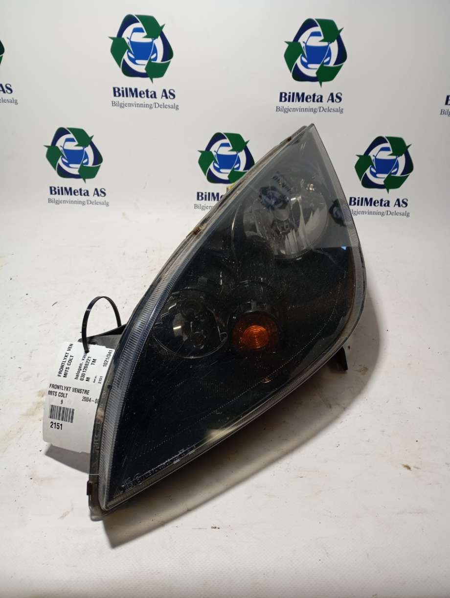 Frontlykt venstre halogen til Mitsubishi Colt 2004-2008 (Type VII, Fase 1) (|0301208221)