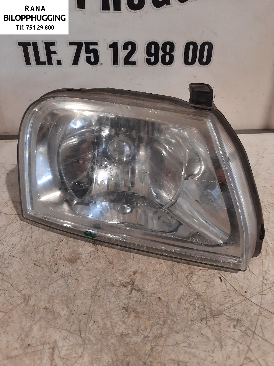 Frontlykt høyre halogen til Mitsubishi L200 1996-2006 (Type III) (2,5 4D56|)